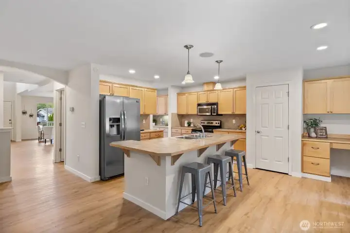 Open kitchen with a nice size island. Plenty of cabinet space along with NEW canned lighting with variable light control!  Choose your lighting!!