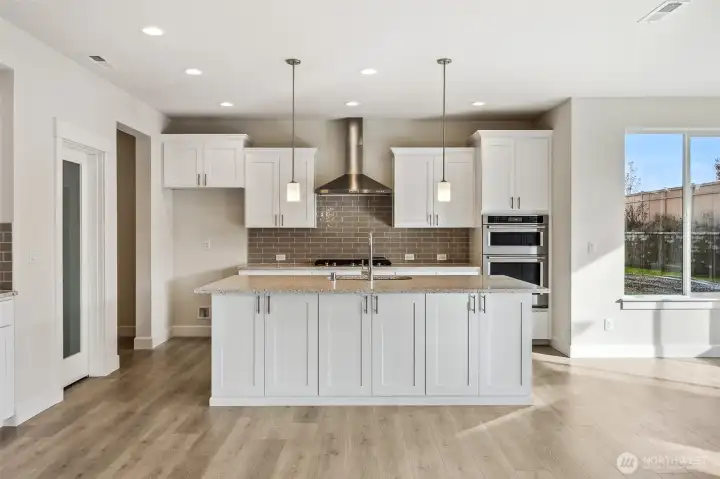 **Photos are of a different home, same plan in the community. Some colors, Features and specs will vary**