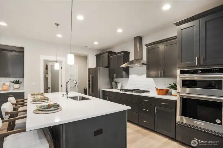 **Photos are of a different home, same plan in the community. Some colors, Features and specs will vary**
