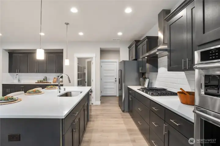 **Photos are of a different home, same plan in the community. Some colors, Features and specs will vary**