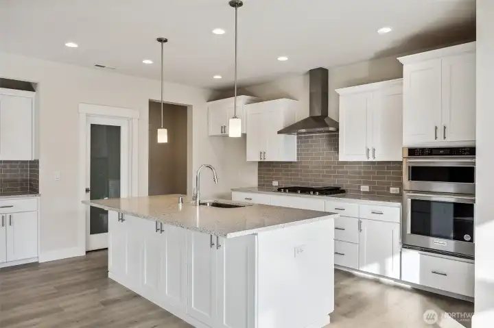 **Photos are of a different home, same plan in the community. Some colors, Features and specs will vary**