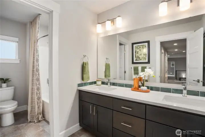 **Photos are of a different home, same plan in the community. Some colors, Features and specs will vary**