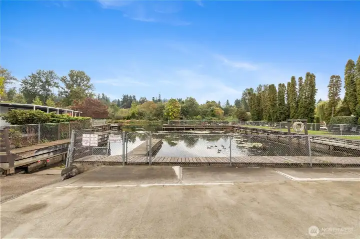 Shared dock and clubhouse — ideal for relaxing or launching your next adventure.