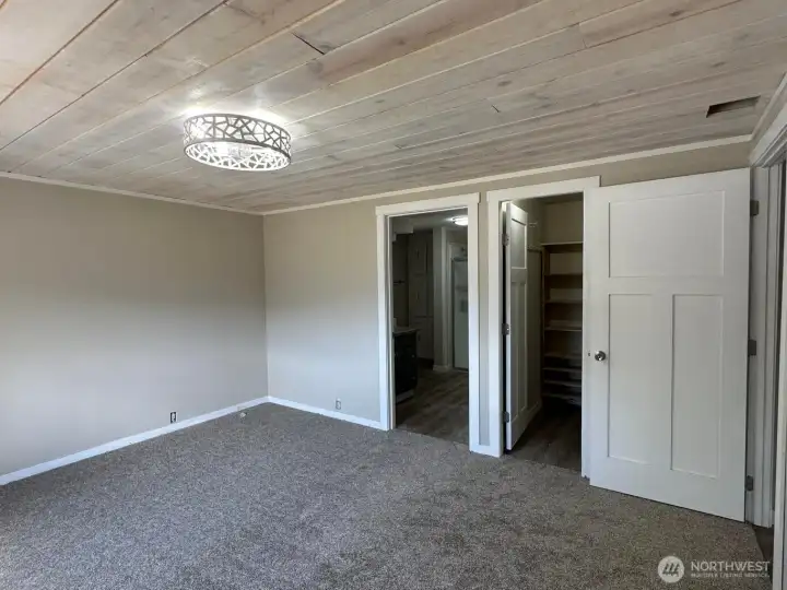 Primary bedroom to primary bath and walk-in closet