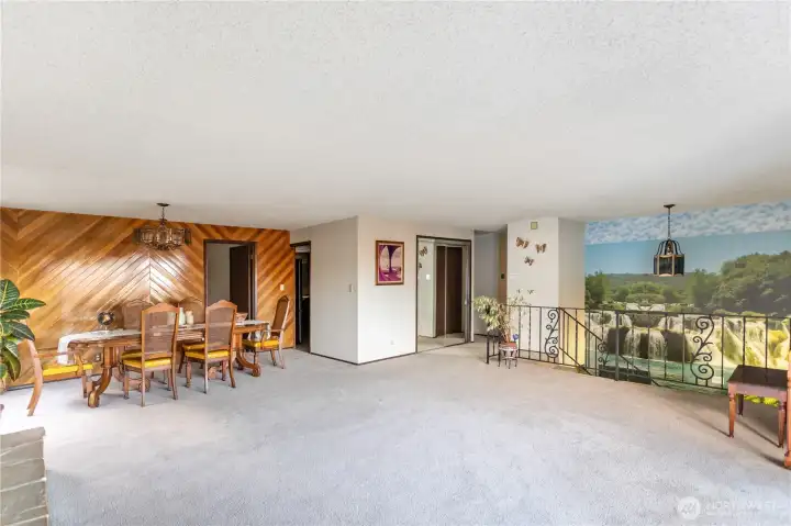 view from living room west & entry to ofc