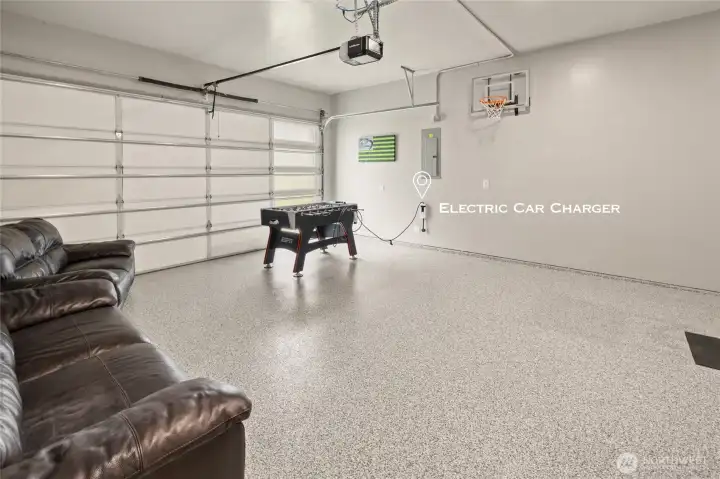 Beautiful epoxy garage floor and EV charger