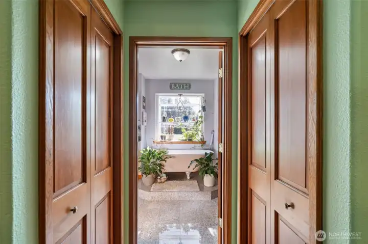 Walk-in closets on each side of entrance to primary bath.