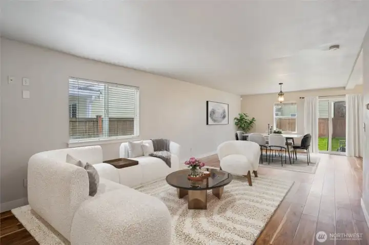 Open floor plan with LVP floors throughout the main and bedrooms