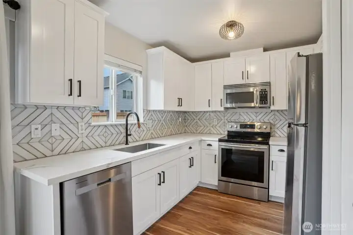Trendy kitchen with stainless appliances