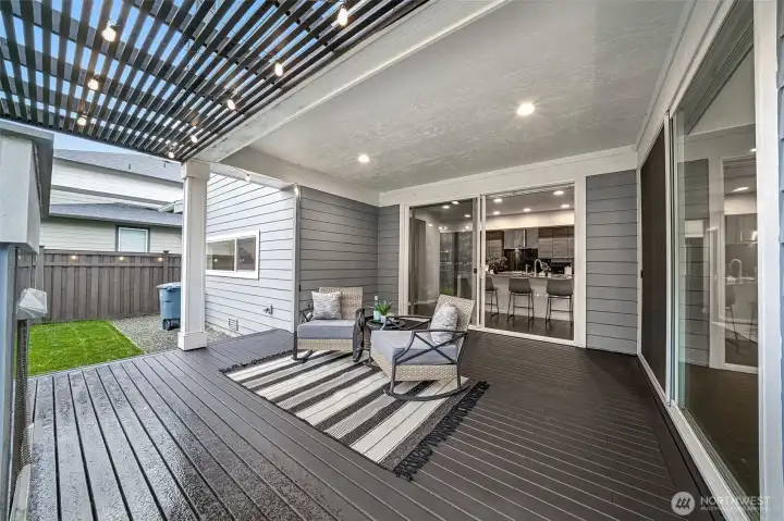 2 sets of sliding glass doors extend the living room and kitchen outdoors!