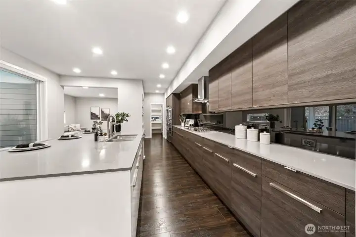 Stainless steel appliances, gas stove, large island, soft close cabinetry, and so much more!