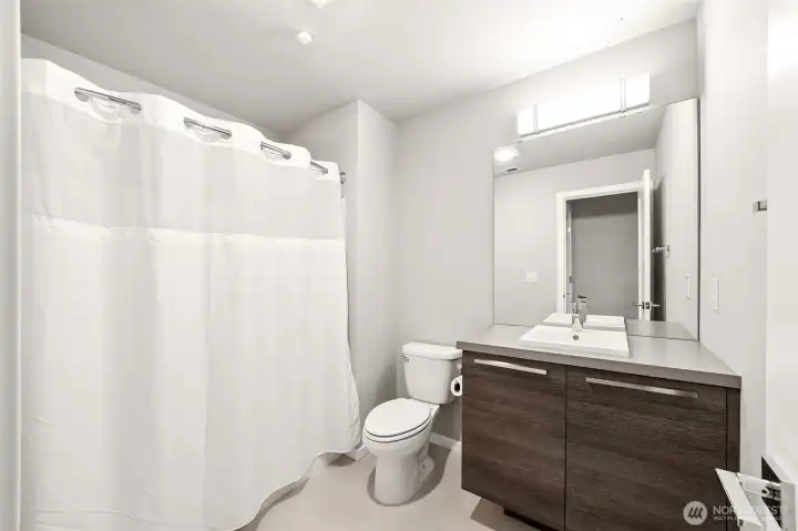 Full bath, in bedroom 1