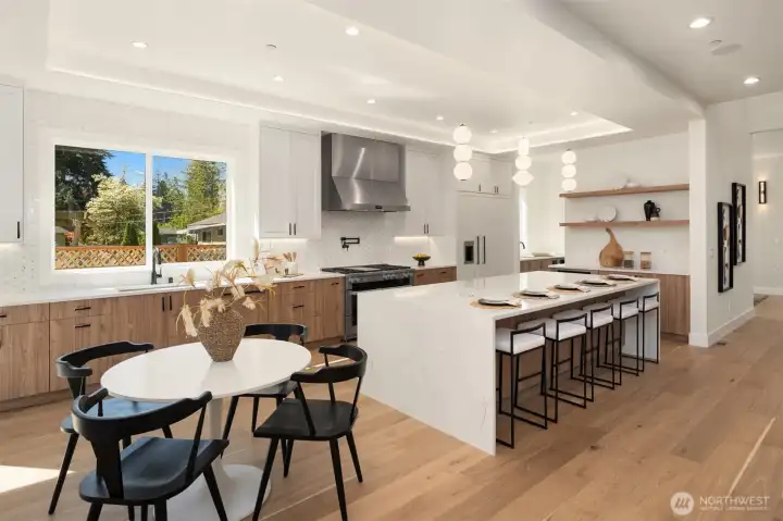 chef's kitchen with profesional-grade Miele applicance package, Kohler pot filler, blanco sink system.