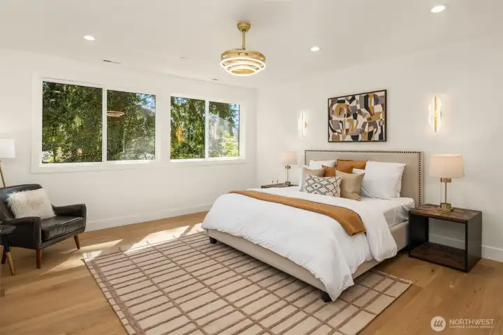 Grand primary suite with designer lighting!