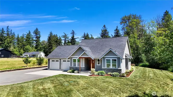 Lots of parking and nice sized garage and lovely entryway.