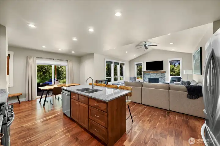 Kitchen view with center island with eat in kitchen.