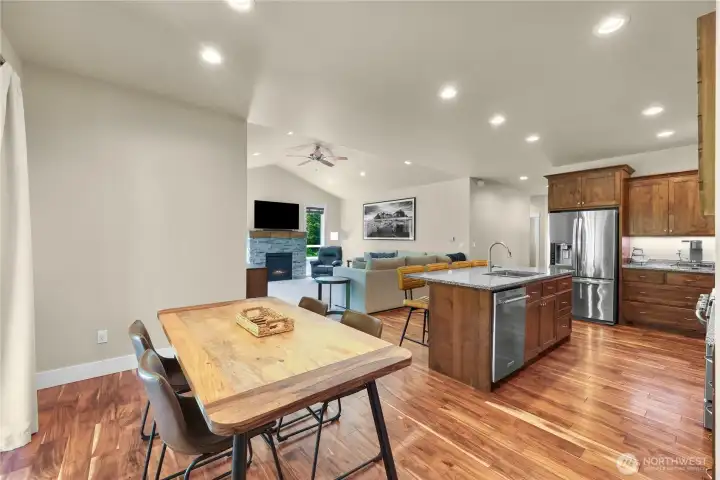 another view of dining area and kitchen.