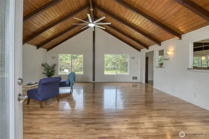 Large open floor plan with tongue in groove vaulted ceiling and ceiling fan Large open floor plan with tongue in groove vaulted ceiling and ceiling fan