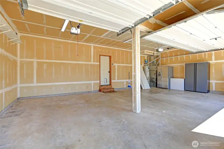 Spacious 3-Bay Garage is Insulated and Room for Everyone~ Spacious 3-Bay Garage is Insulated and Room for Everyone~