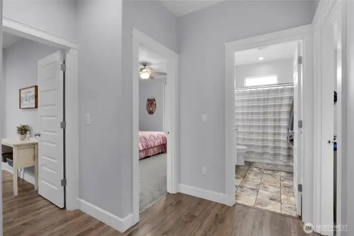 Wide, bright hallways create an easy flow throughout the home's well-planned single-level layout.