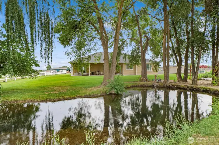 Fenced pasture, creek, and room to grow.