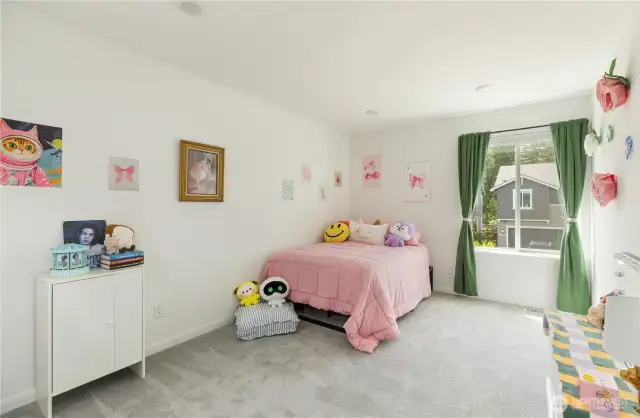 Bedroom in the southwest corner of the upper level.