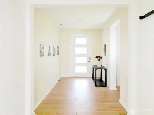 Entryway. Doorway on the right goes to the main floor 3/4 bath and guest bedroom.