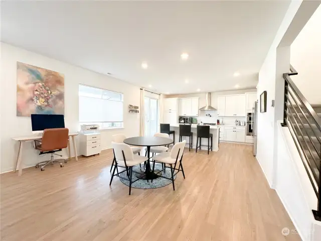 Kitchen, dining area, and stairway up to the loft on the right.