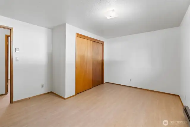 Another view of the first guest bedroom showing the closet.