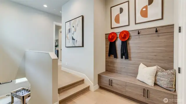 Mud Room situated as you enter from the garage, before heading to the Main Level, or down to the Lower Level Rec Room.
