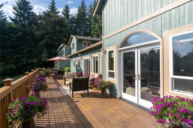 Main house 14 x 52 freshly stained cedar deck.