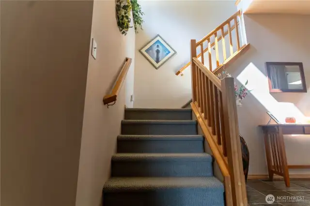 Stairs to upper floor and bedrooms.