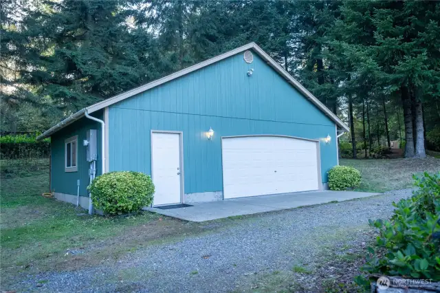 24 x 32 detached garage/shop, finished inside with propane heater.