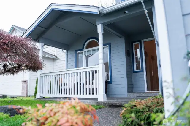 Enjoy conversations on the covered front porch