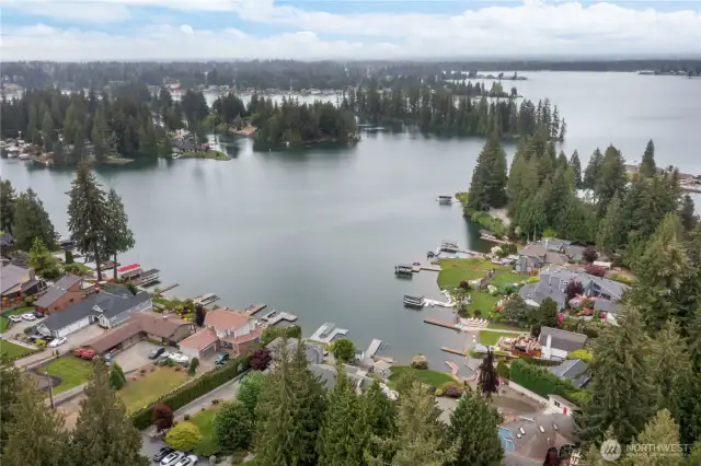 Highly sought after Lakeridge Cove, offering protected swimming, level waterfront and stunning lake views