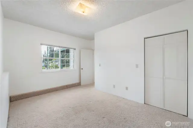1 of 2 additional finished rooms with closets downstairs