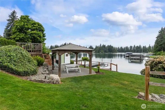 Level waterfrontage with gazebo, outbuilding, easy access to the lake