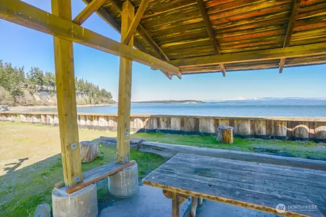 Covered dining area at one of the 3 private beaches in the Camano Country Club.