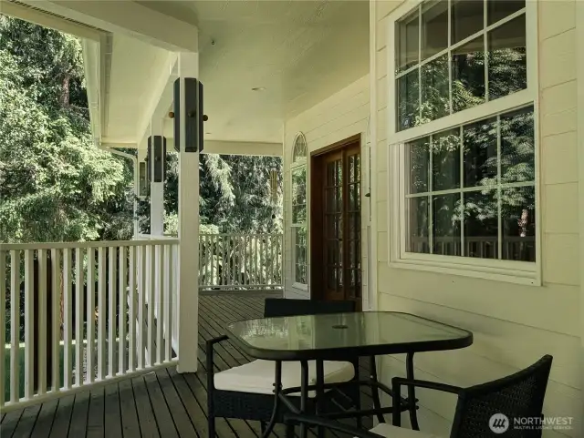 Relax on the coverd porch at back of the home. #10920 Chaucer St SE, Olympia, WA 98501