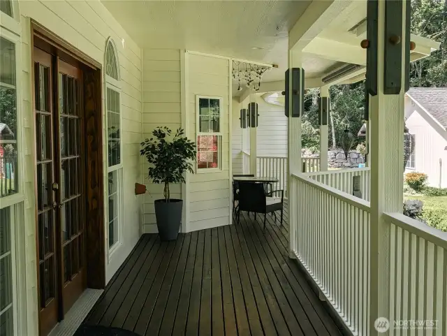 Relax on the coverd porch at back of the home. #10920 Chaucer St SE, Olympia, WA 98501