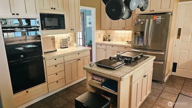 Chef's Kitchen with double oven and gas cooktop. All appliances stay. #10920 Chaucer St SE, Olympia, WA 98501