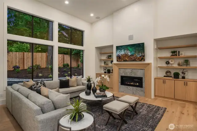 Vaulted great room that overlooks the private backyard