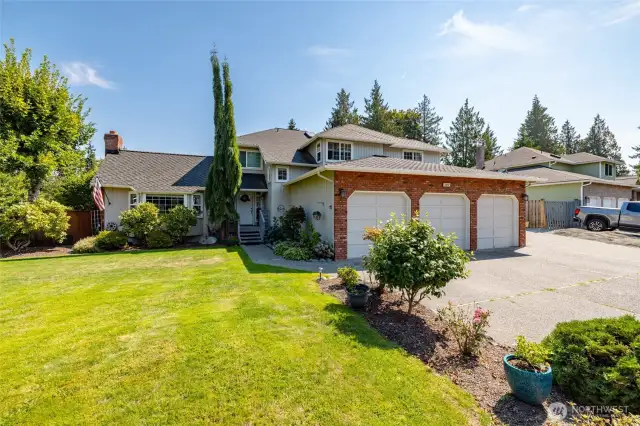This beautiful home sits on a large corner lot with lots of parking.