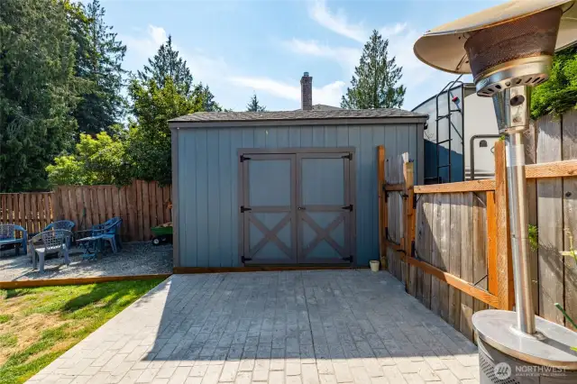There is a shed for extra storage.