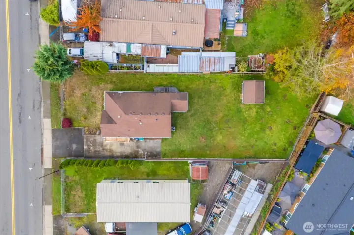 Huge backyard is level, fully fenced and surprisingly private!