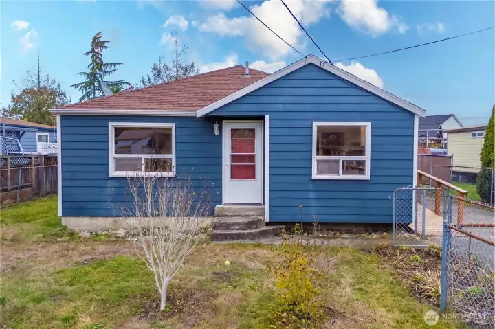 Cute little rambler has great curb appeal.