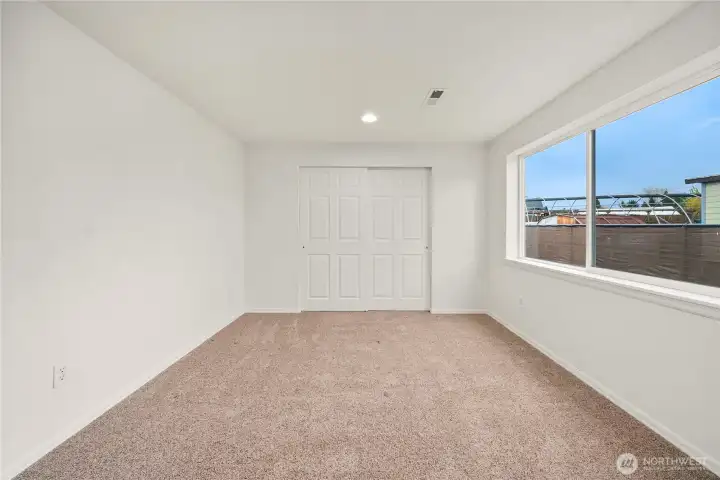 Large third bedroom on back corner of home.