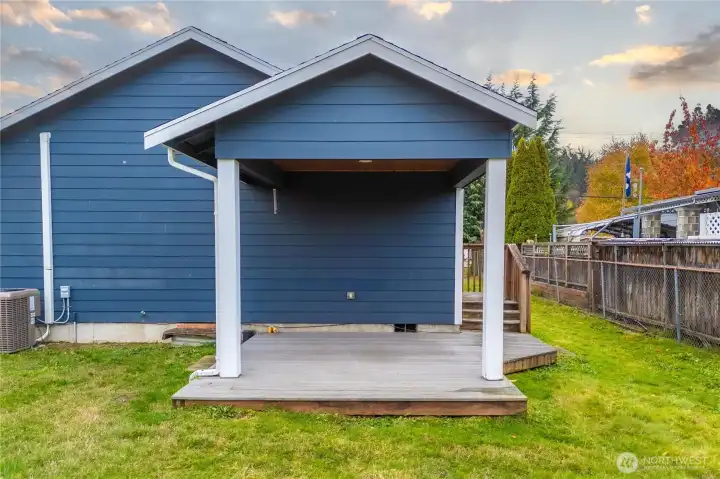 Private deck off back of home is covered and ready to enjoy year round.