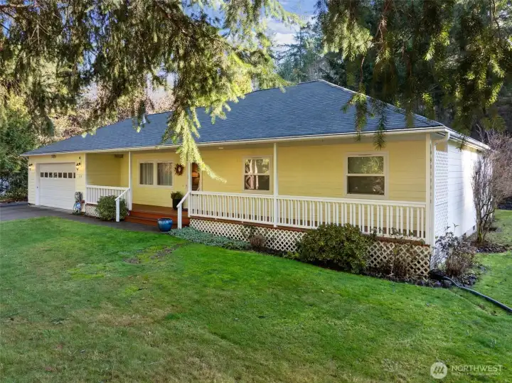 Gracious front entry with covered porch.