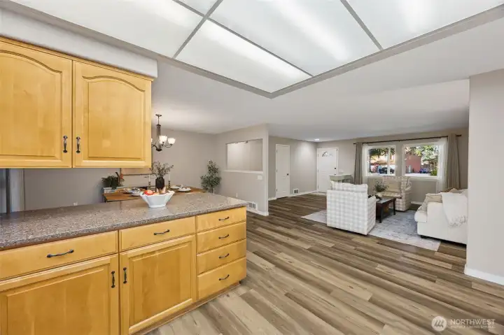 View of the kitchen and main living area looking toward the front.